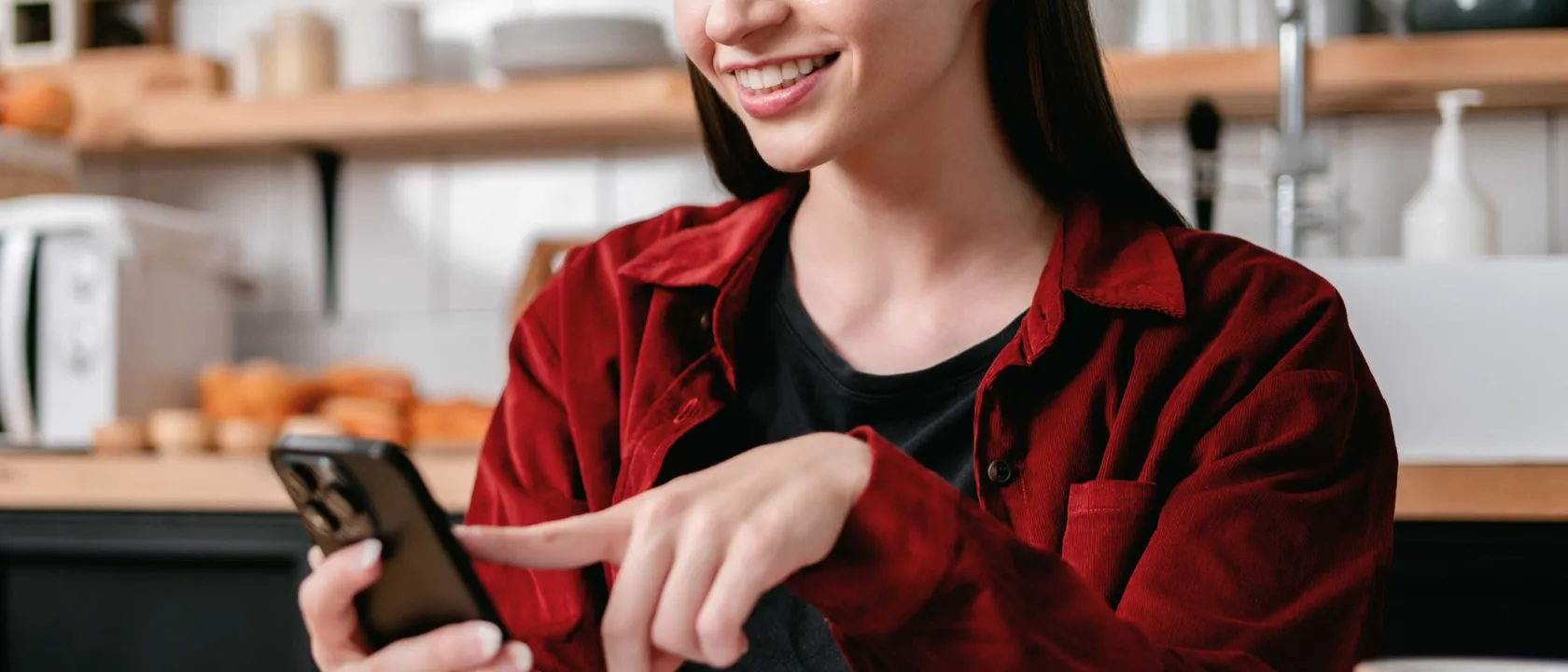 Young businesswoman using a smartphone to search for business information
